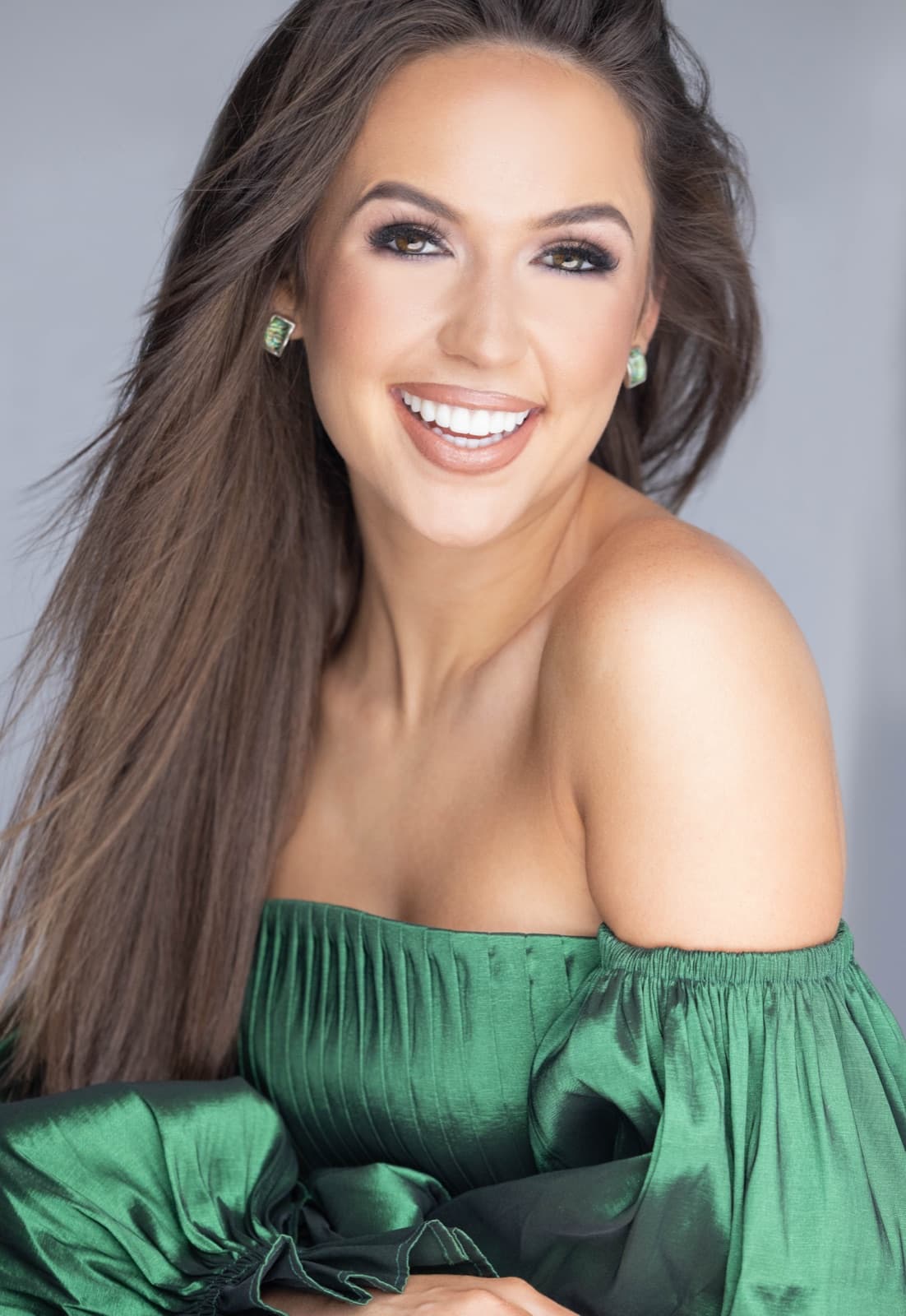 A real client's radiant, glowing smile