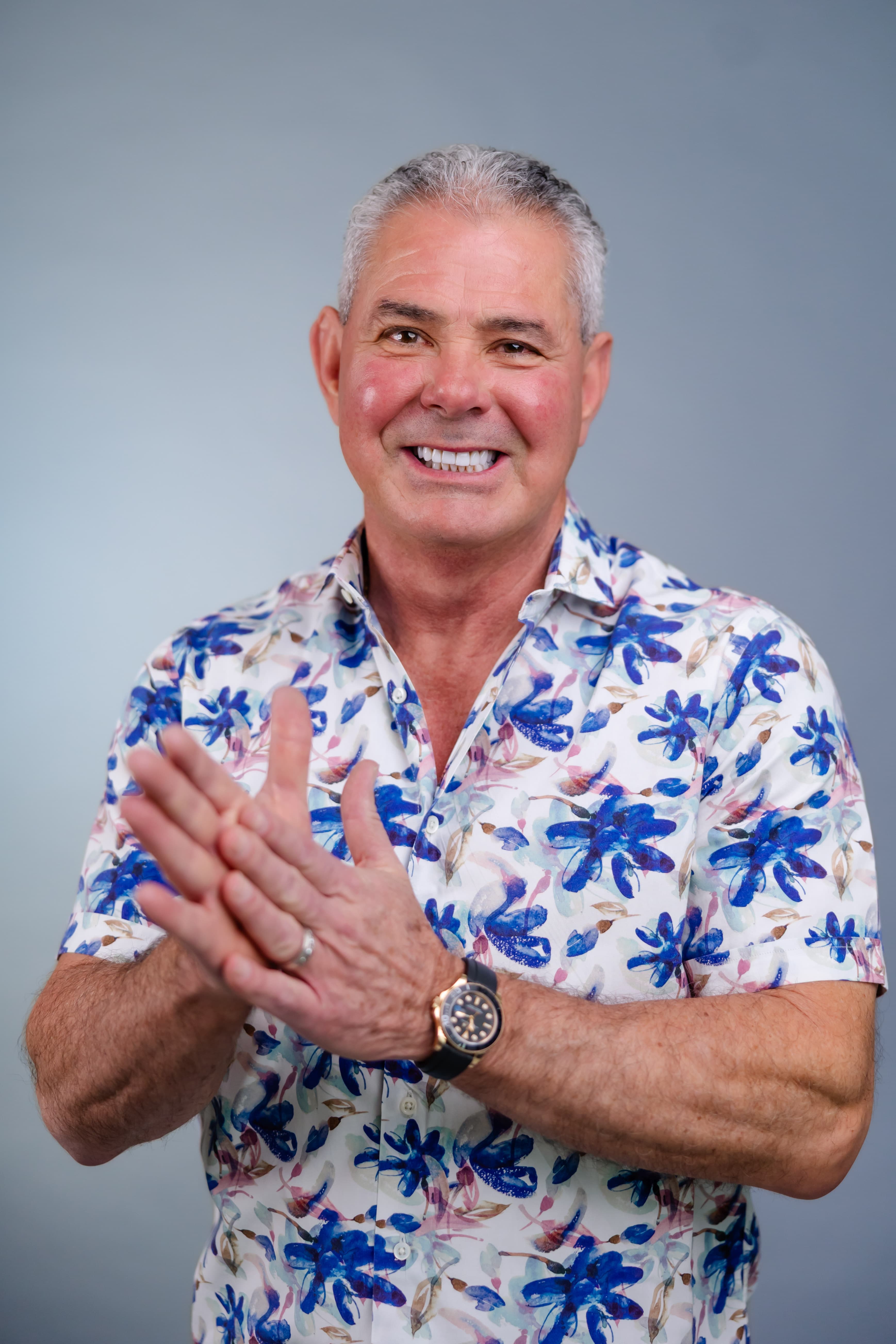 A real patient's confident, natural smile, dental implants in Charlotte